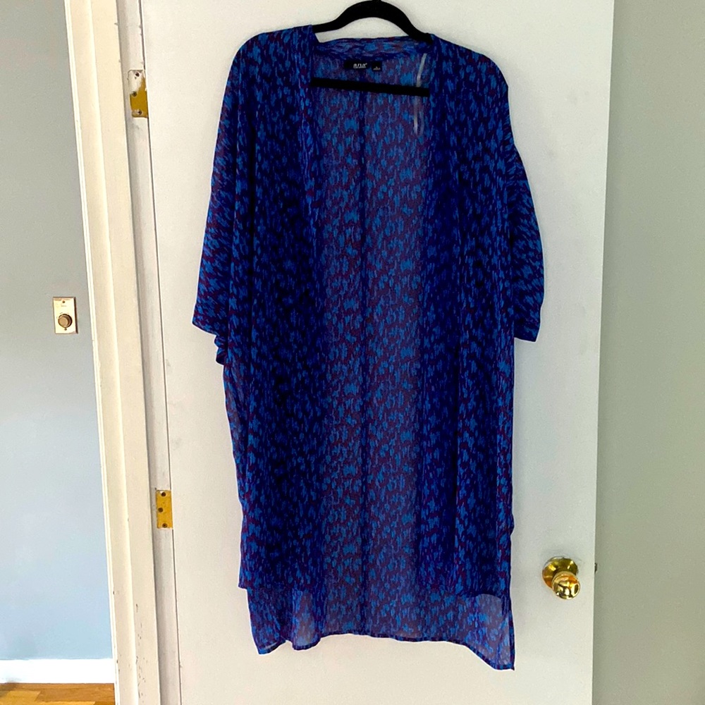 Blue/purple summery design shall. Cute over jeans with white tank.
